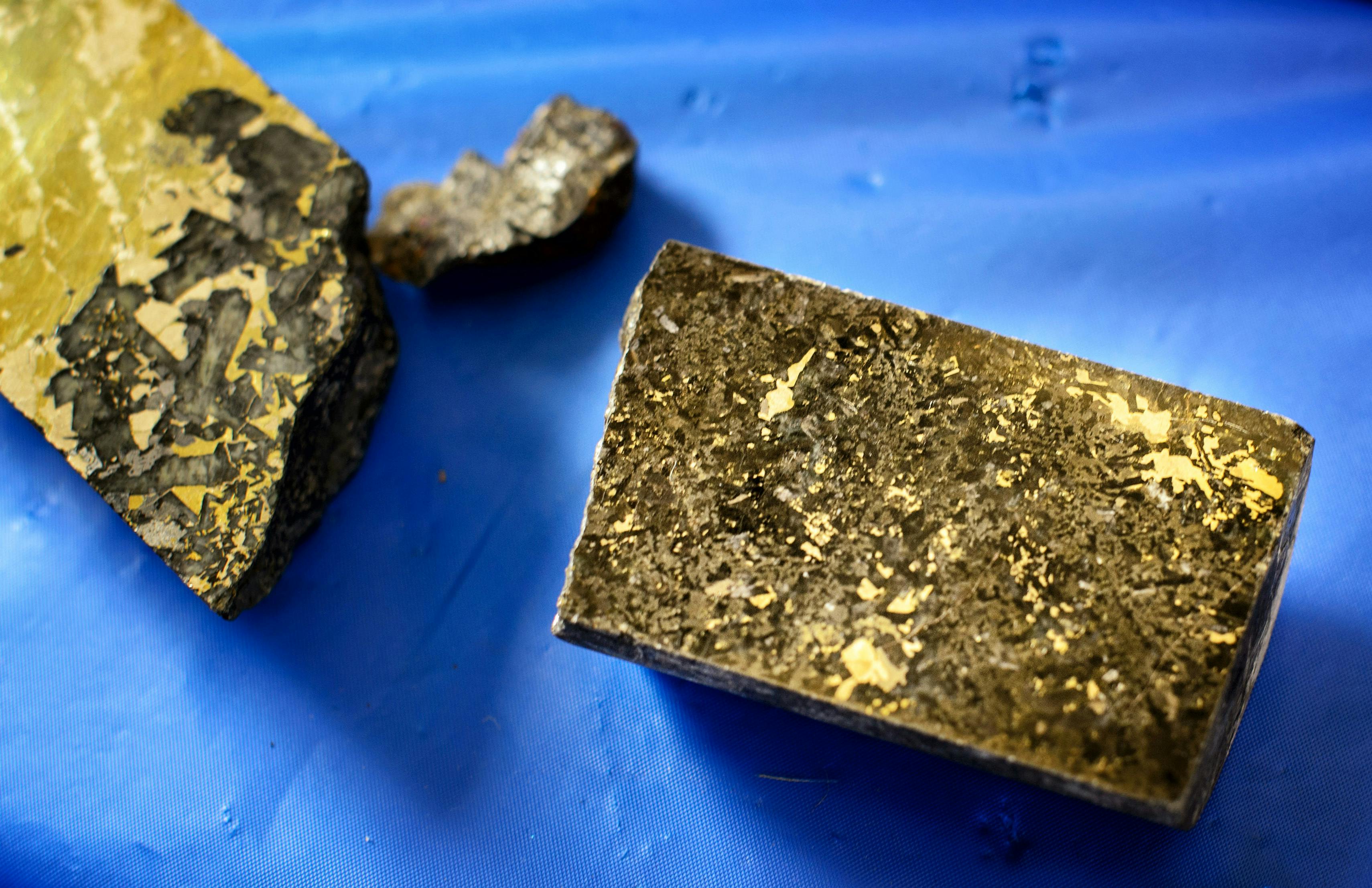 Flecks of ore containing copper, nickel, cobalt, palladium, platinum and gold seen in core samples taken from around PolyMet property.