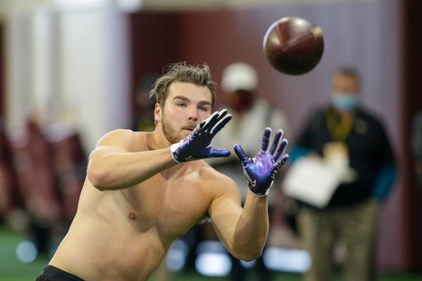 Former St. Thomas tight end Nick Guggemos made a catch during the University of Minnesota NFL football Pro Day in April.