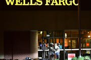 Police led Ray R. McNeary away from a Wells Fargo bank branch in St. Cloud following a standoff of nearly nine hours on May 6, 2021.
