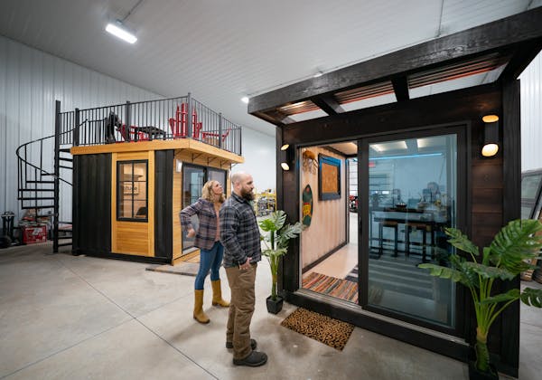 Andy and Sarah Berg showed off their prototypes of a TikiTainer at right, and a home studio, left, at their Latitude Studios showroom and factory floo