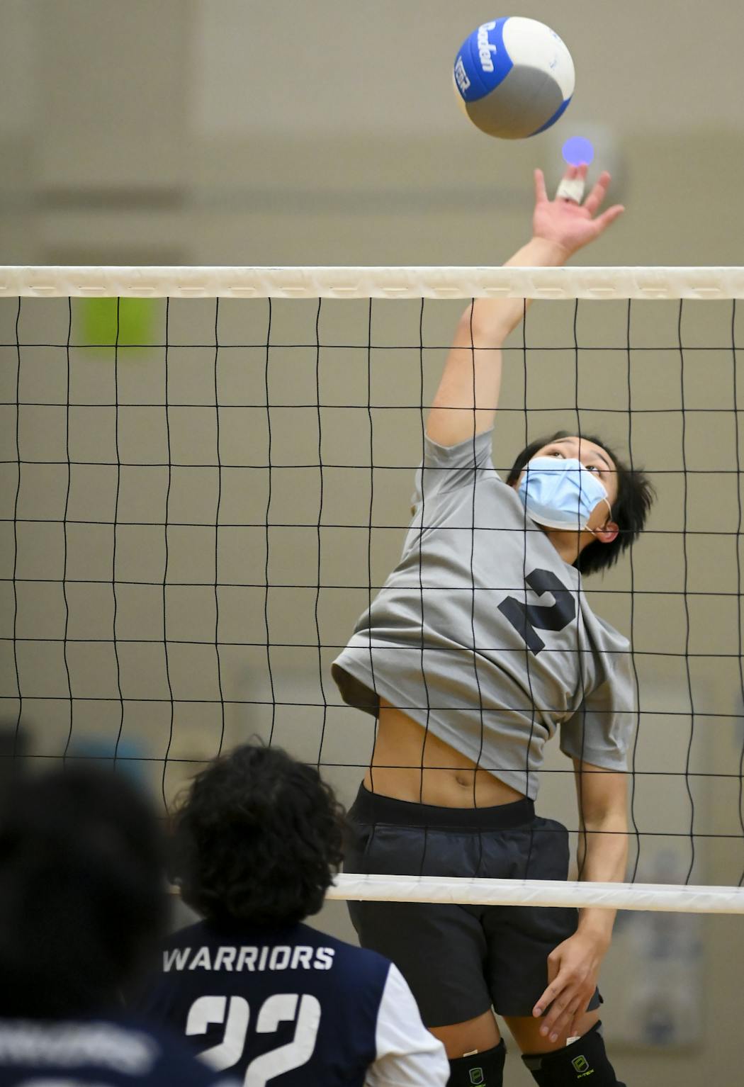 Roseville senior Peng Su Thao spiked the ball against Hmong Prep Academy in a Wednesday match. A proposal to make boys’ volleyball a spring sport is expected to be considered Tuesday by a key Minnesota State High School League decision-making body.
