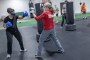 Betty White sparred recently at Elements Boxing Gym in St. Paul. She’s among a growing number of people with Parkinson’s taking up the sport to st