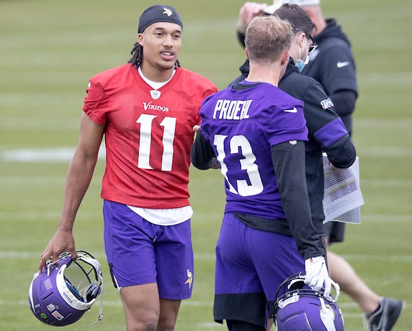 Vikings rookies quarterback Kellen Mond talked to receiver Blake Proehl during Friday’s rookie minicamp in Eagan.