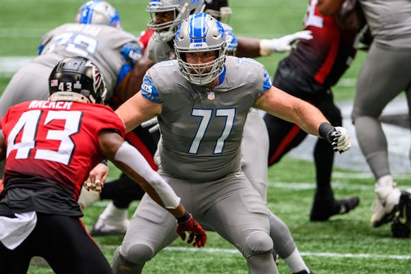 Lions center Frank Ragnow prepared to block the Falcons’ Mykal Walker during a game in Atlanta last season.
