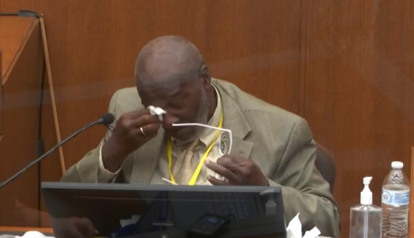In this image from video, witness Charles McMillian became emotional as he answered questions on March 31, 2021, in the trial of former Minneapolis po