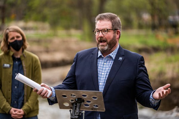 Hennepin County Commissioner Chris LaTondresse spoke at an event in Arden Park in Edina in May 2021.