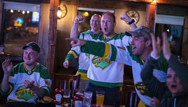 A group of Russian American Wild fans reacted to a Wild goal in the second period during a playoff game between the Wild and the Vegas Knights at Cowb