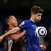 Leicester’s Youri Tielemans, left, duels for the ball with Chelsea’s Christian Pulisic 