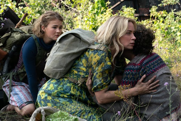 Left to right, Regan (Millicent Simmonds), Evelyn (Emily Blunt) and Marcus (Noah Jupe) brave the unknown in “A Quiet Place: Part II.”