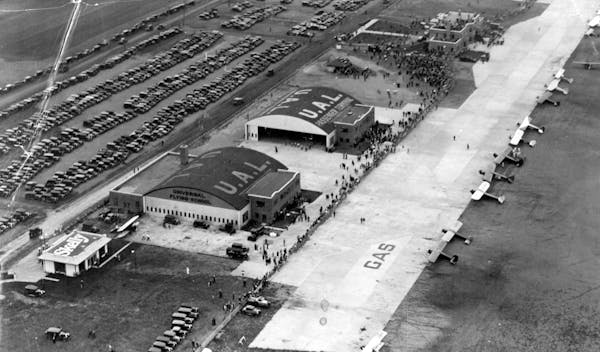 Crowds gathered at Wold-Chamberlain Field in September 1930 for the arrival of famous French pilots. The welcome coincided with a dedication of the ai
