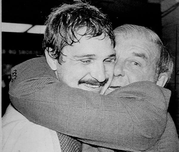 North Stars goalie Gilles Meloche, left, got a big hug from team scout and former goalie Gump Worsley after Minnesota beat Montreal 3-2 in Game 7 of t