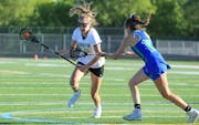 Lakeville South’s Emily Moes (11) scored a game-high seven goals in a non-conference matchup against Blake Friday evening. The Cougars defeated the 