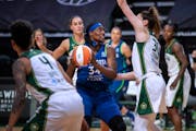 Sylvia Fowles had her path to the rim blocked by Seattle’s Breanna Stewart during the first quarter