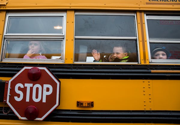 The agreement between the families who sued and the state of Minnesota calls for requiring all metro schools to provide free busing to students from d