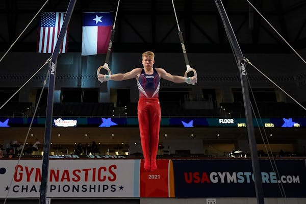 Shane Wiskus competes on the still rings during the U.S. Gymnastics Championships Thursday