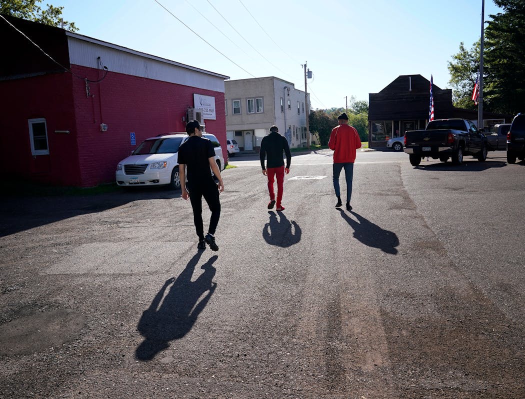 Circle of Discipline boxers Jamal (Shango) James, Veshawn Owens and Isaiah Abalan (right to left) walk to breakfast at the Rustic Diner after their morning workout