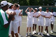 Edina High School tennis players celebrated when they realized they’d won the boys Class 2A team tennis championship against Wayzata Wednesday. ] AN