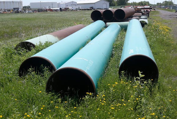 Shown are pipes being stored for use on Enbridge’s Line 3 construction project, which is now 60% completed.