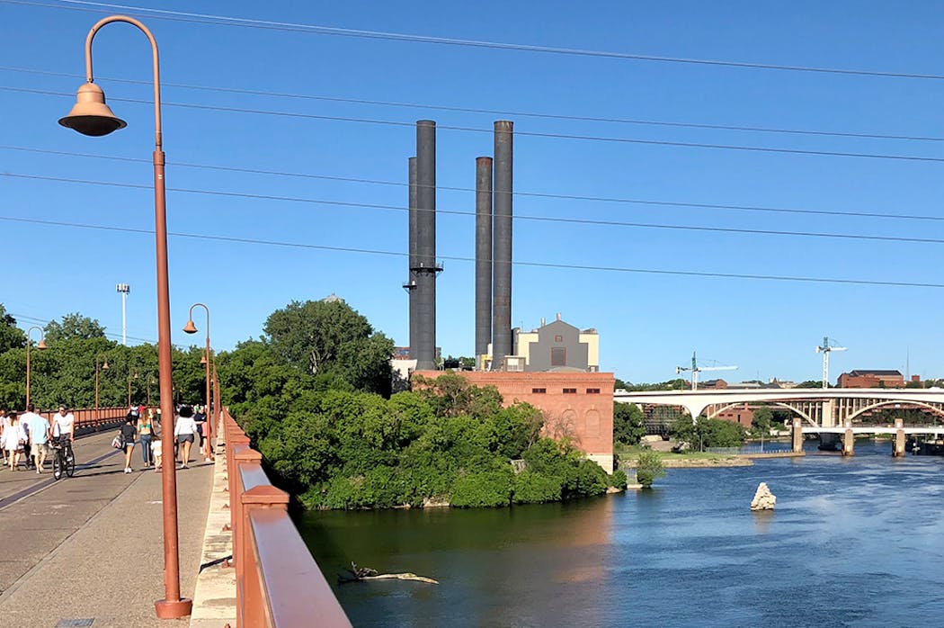 Two piers visible on a walk across the Stone Arch Bridge are all that remain of the first 10th Avenue Bridge.