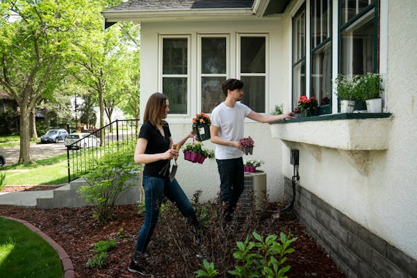 Kelsey Devine and Alex Bauman planted the window box at their new house in Minneapolis. The couple were aggressive with their offer and waived an insp