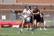 Mary Zavoral (7) races past defender Fiona Lynch (8). Zavoral scored two goals for the Red Knights. Eden Prairie vs. Benilde-St. Margaret’s in the 2