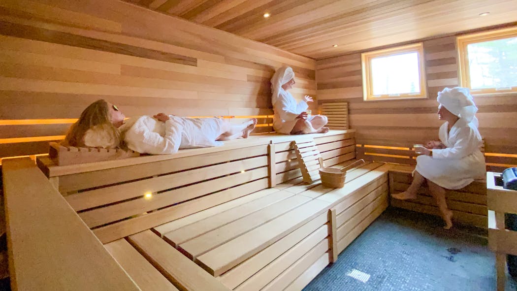 The sauna house at Wild Rice Retreat is outfitted with a rain-shower room.