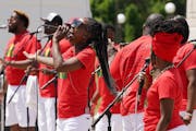 The musical group “Sounds of Blackness” performed during a gathering to celebrate Juneteenth on Saturday at the State Capitol. 