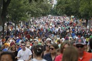Thousands packed the Minnesota State Fair Friday, Aug. 26, 2016, in Falcon Heights, Minn. (AP Photo/Jim Mone)