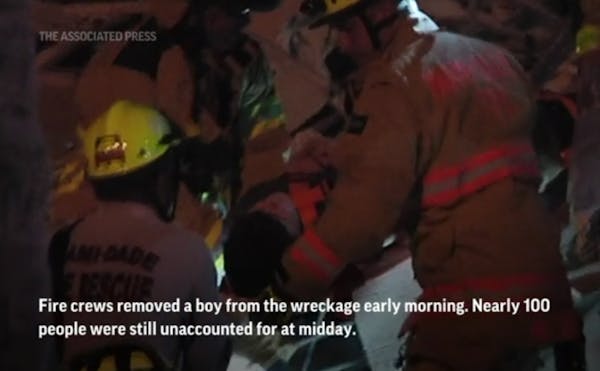 Boy pulled from rubble after Miami condo collapse