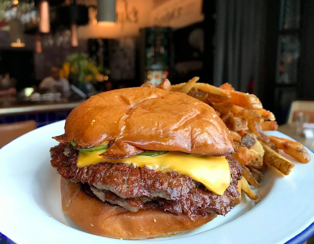 The burger at Sidebar at Surdyk’s in Minneapolis.