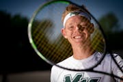 Mounds View High School tennis player Bjorn Swenson posed for a photo on the courts at Mounds View High School in Arden Hills, Minn., on Friday, June 