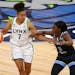 Minnesota Lynx’s Layshia Clarendon (7) is defended by Chicago Sky’s Dana Evans (11) during the second half of a WNBA basketball game Tuesday, June