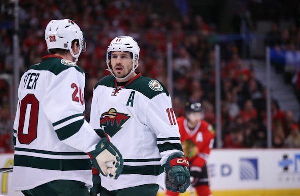 Zach Parise, right, and Ryan Suter, left, spent nine seasons together with the Wild before having their contracts bought out on Tuesday.