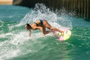 Carissa Moore of the United States is a gold medal contender in surfing at the Tokyo Olympics.