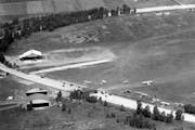 The former racetrack oval was still visible at the budding airport in 1928. 