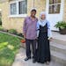 St. Cloud residents Youssouf “Joe” Omar and Hamdia Mohamed stand by a duplex they own as part of their business, Victory Plus Housing.