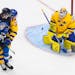 Sweden goalie Jesper Wallstedt made a save on Finland’s Samuel Helenius in January at the world junior hockey championship.