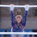 Sunisa Lee of United States of America performs on the uneven bars during women's qualification for the Artistic Gymnastics final at Ariake Gymnastics