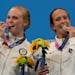 Delaney Schnell and Jessica Parratto, right, posed with their silver medals Tuesday in Tokyo.