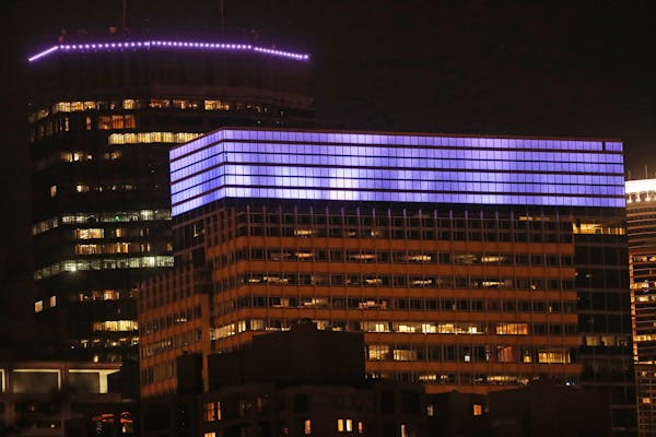 South Tower of Target’s Corporate headquarters and the IDS building were lit purple to mark the one-year anniversary of Prince’s passing on April 