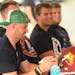 Gophers quarterback Tanner Morgan (front) and teammates signed autographs last summer in an appearance at Baldy’s BBQ in Lakeville.