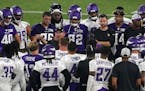 Vikings head coach Mike Zimmer talked with his players during practice Saturday night.