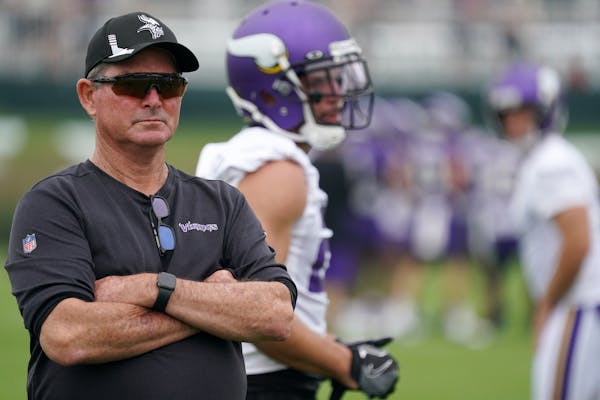 Mike Zimmer was not pleased being without three quarterbacks at training camp on Monday.