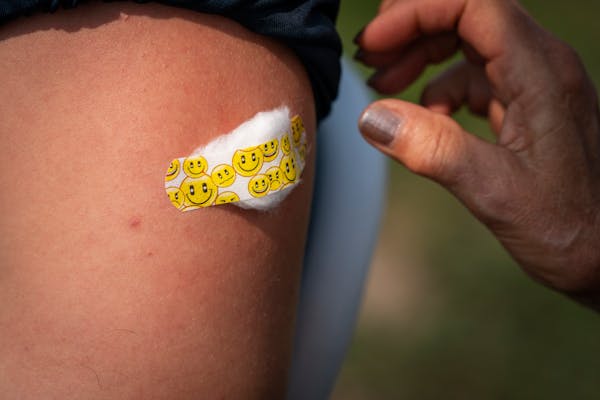 Mason Nadolney got his second COVID-19 vaccine shot during a mobile vaccine event at Chanhassen High School in July.