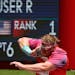 The United States’ Ryan Crouser set an Olympic record on his first throw — and then kept resetting it throughout the competition — to win the go