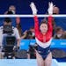 Sunisa Lee of the United States competing on the uneven bars during the women’s team gymnastic’s final at the delayed Tokyo 2020 Olympic Games in 