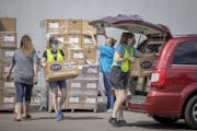 Volunteers loaded boxes for 84 metro area nonprofits and school districts receiving school supplies at the annual Greater Twin Cities United Way’s d