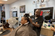 “Get vaccinated. Save a life,” said Teto Wilson, owner of Wilson’s Image Barbers & Stylists in north Minneapolis. Wilson’s is one of more than