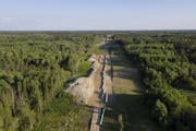 An aerial view of Line 3 pipeline construction near Park Rapids, Minn., in early June. ] Tim Gruber/The New York Times