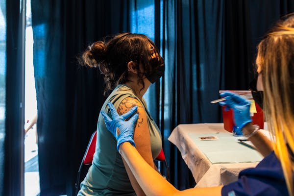A COVID-19 vaccination event at FTX Arena in Miami on Aug. 5, 2021.